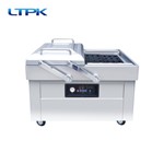 Double chamber vacuum packaging machine
