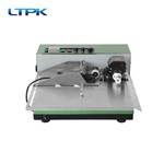 380 coding machine widens spray paint shell