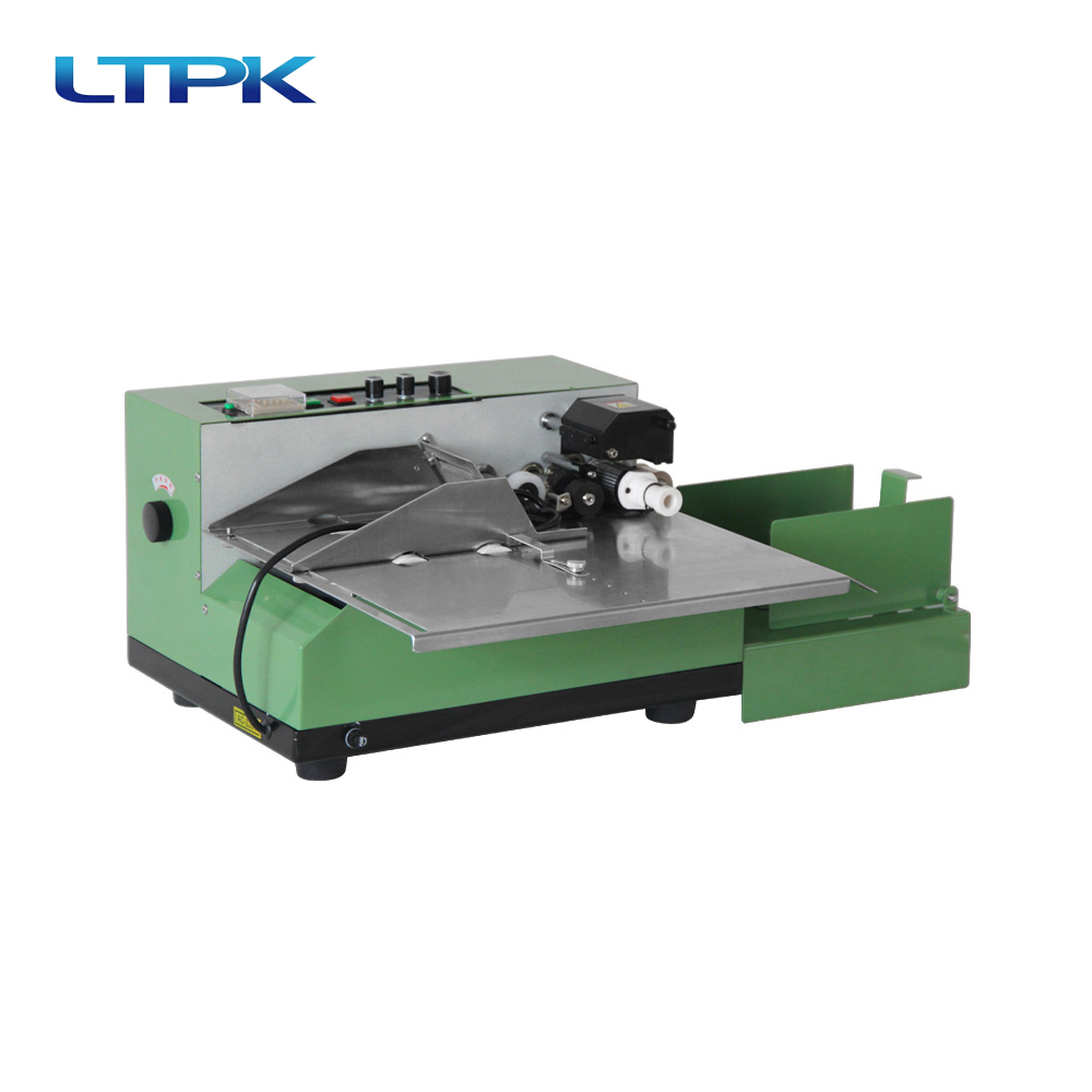 380 coding machine widens spray paint shell