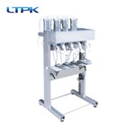 Perfume filing machine /four