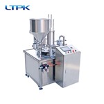 Automatic rotary filling and sealing machine