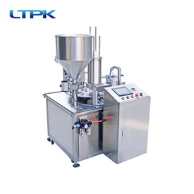 Automatic rotary filling and sealing machine