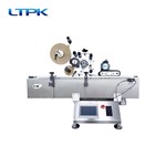 Desktop round bottle horizontal labeling machine
