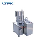 Automatic rotary filling and sealing machine