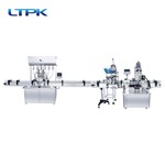 Six-head self-flow filling machine+Automatic drop cover+Automatic rubbing machine